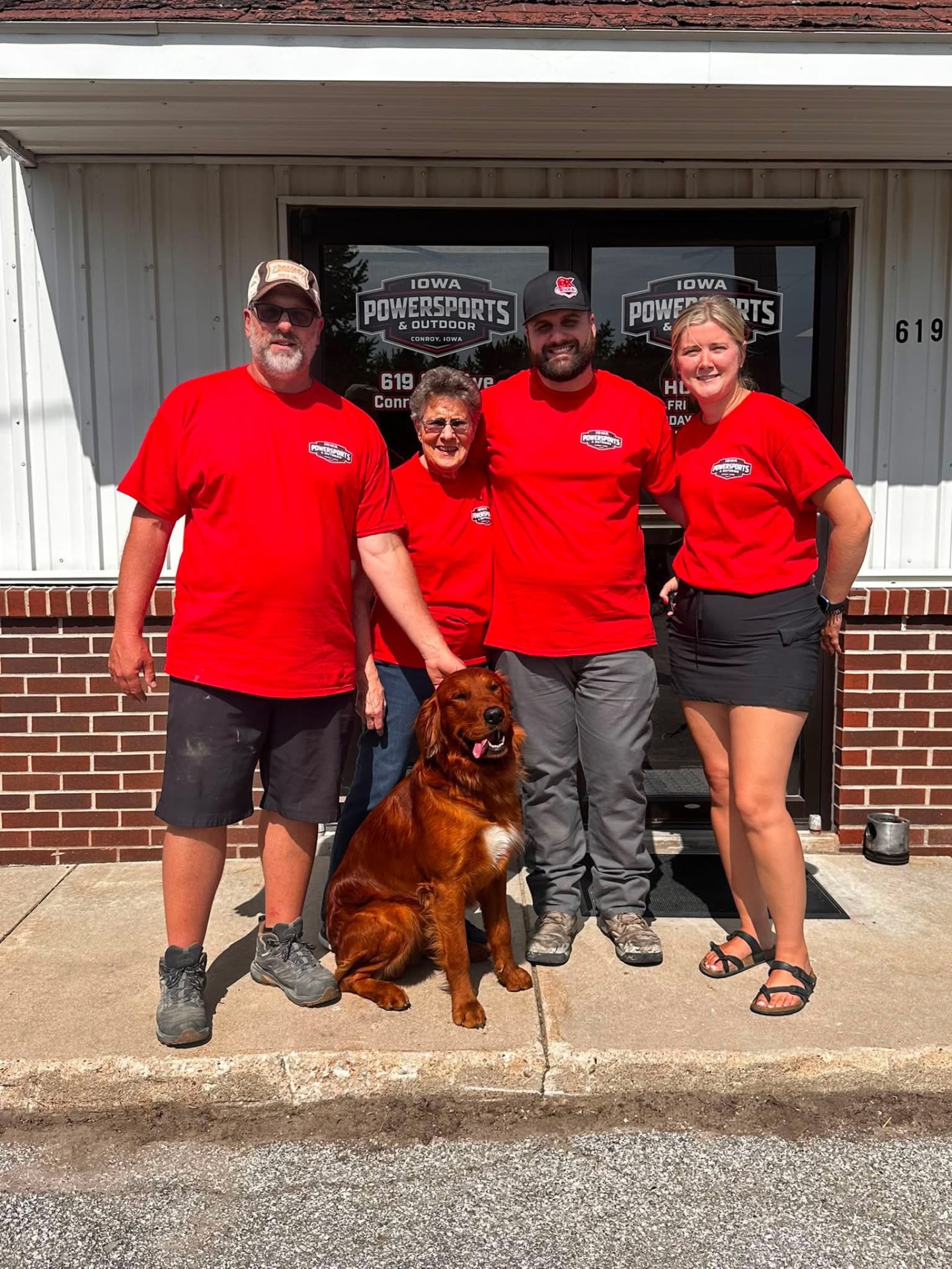 The Iowa Powersports & Outdoor team in front of the Conroy, Iowa shop