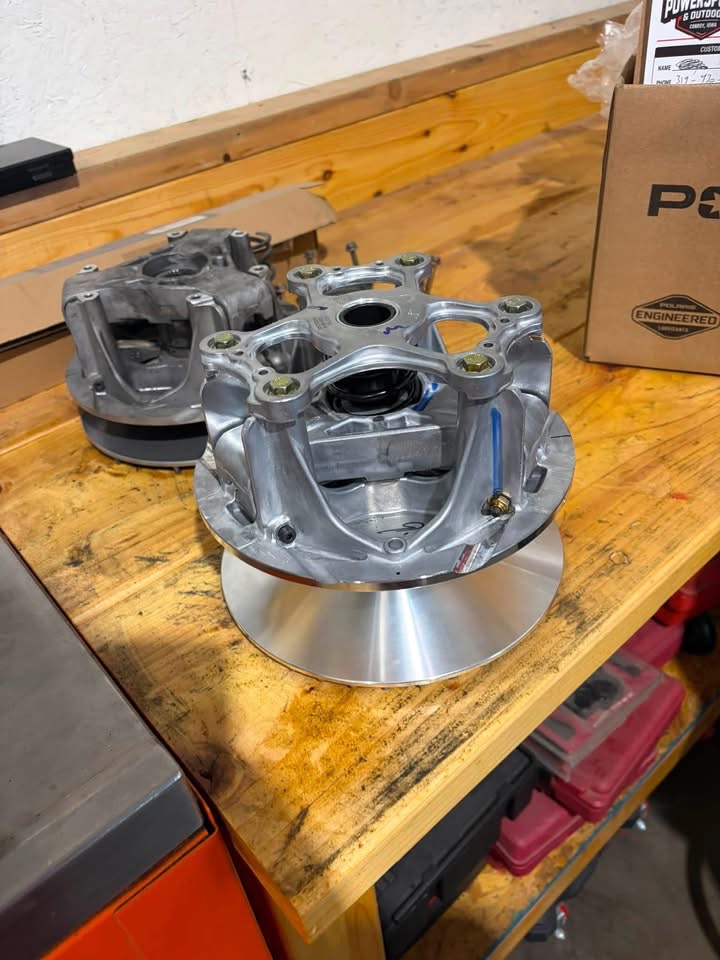 New primary clutch alongside the original clutch pulled from the Polaris Ranger